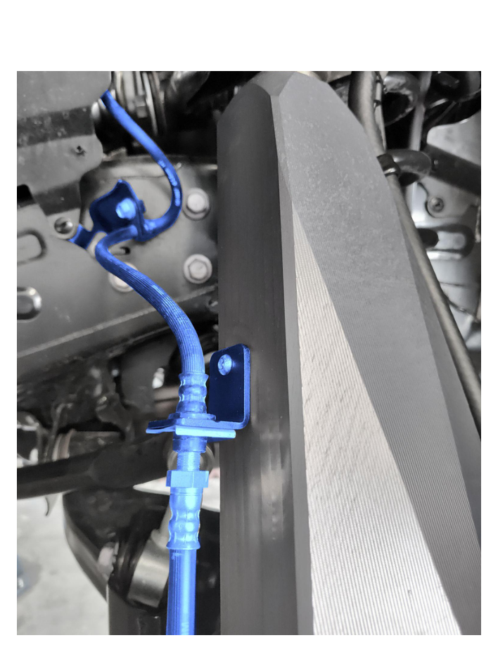 Install brake line retaining bracket and route brake line