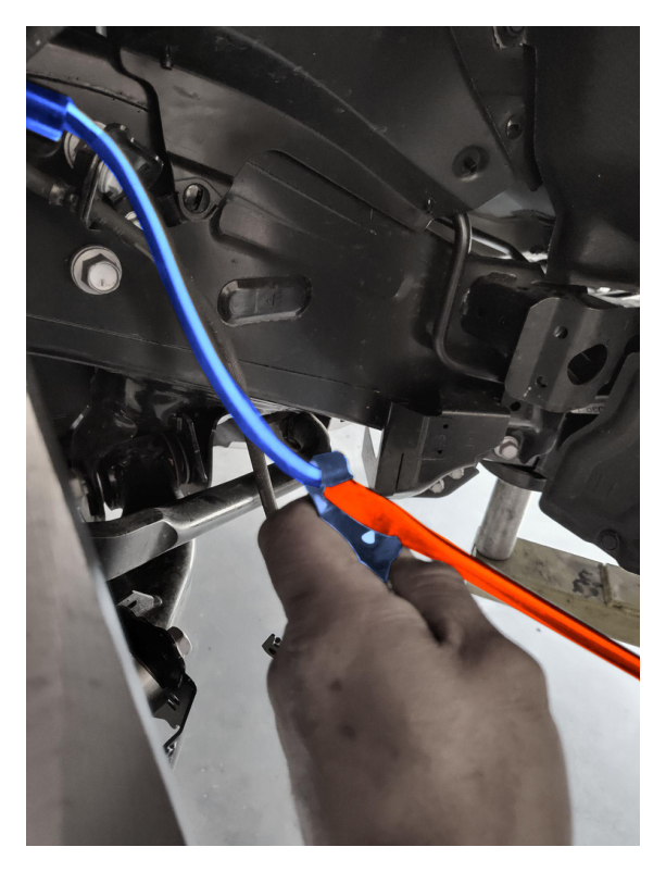 Front breather lines routed to catch can in engine bay