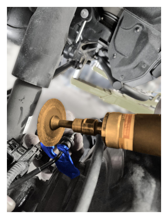 Cut slit in hard line retaining bracket — DO NOT CUT THE HARD LINE