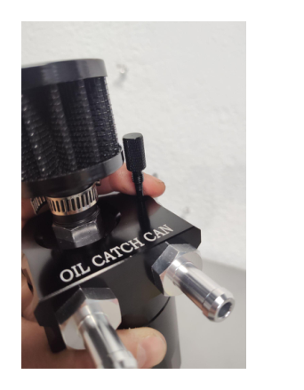 Remove bottom of can and drop steel wool in