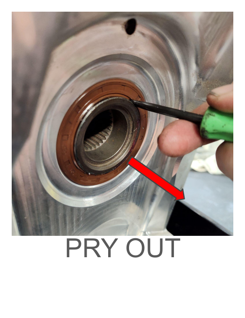 Front upper gear seal — pry out