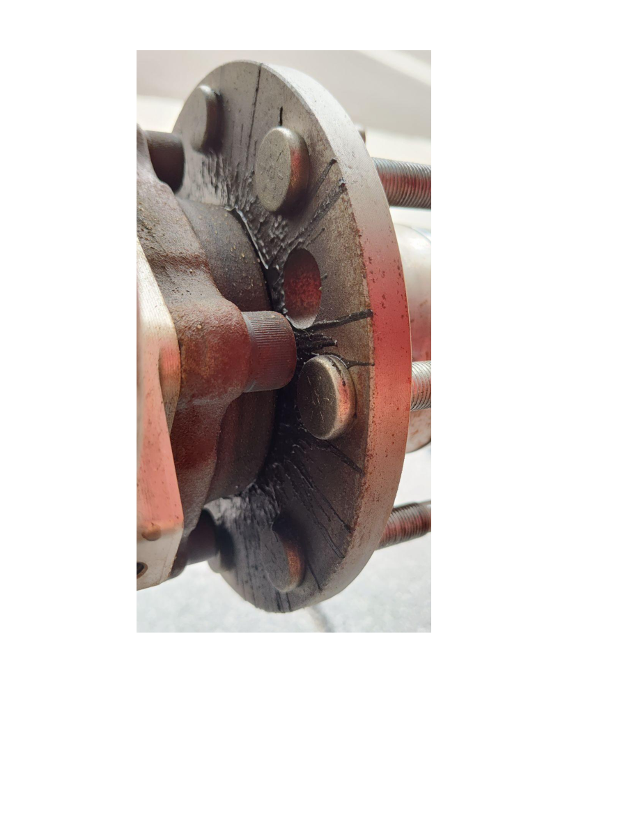 Leak behind unit bearing wheel flange — detail