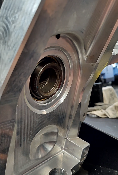 Portal oil fill plug location